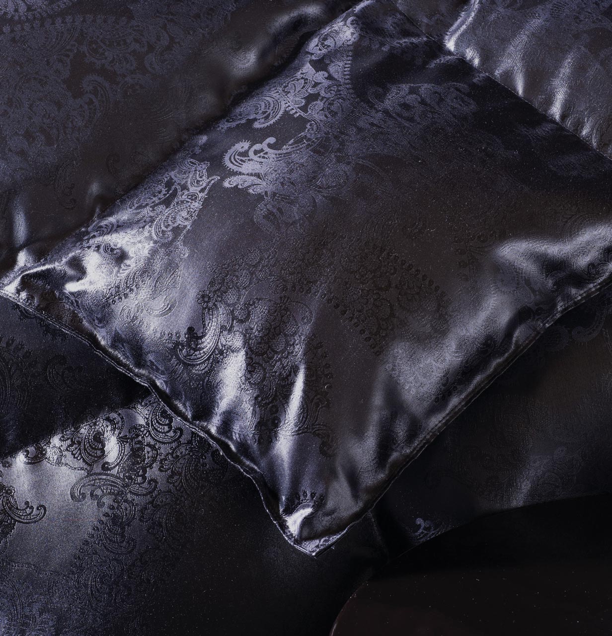 Close-up of the billerbeck eiderdown duvet with black silk jacquard cover