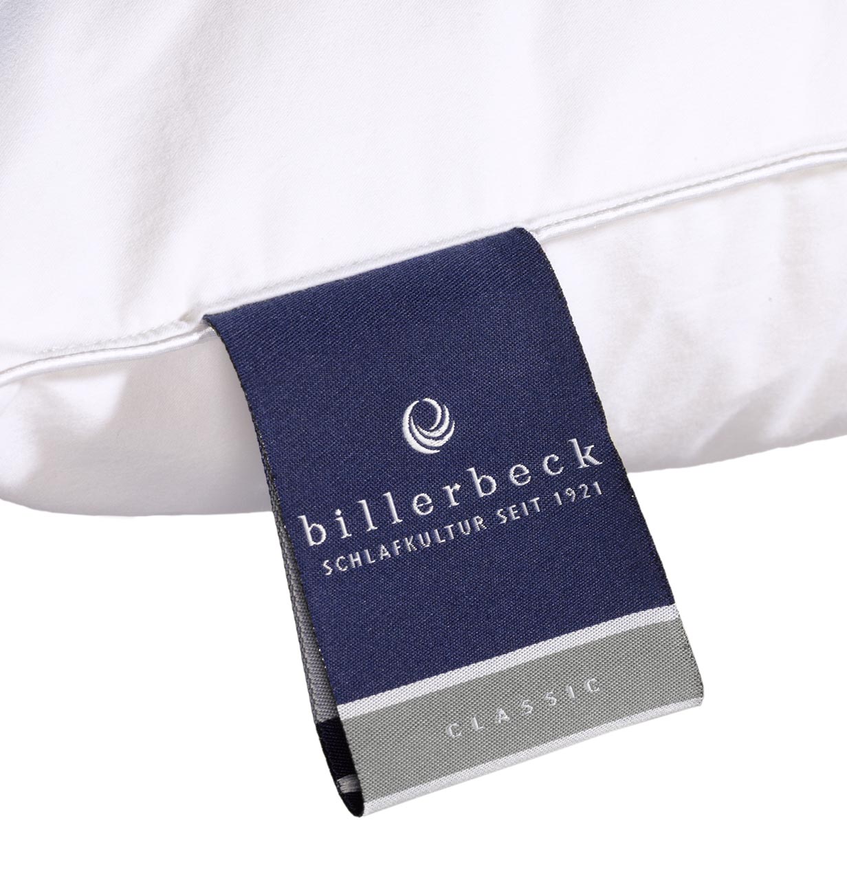 Close-up of the blue billerbeck label on Almira down pillow