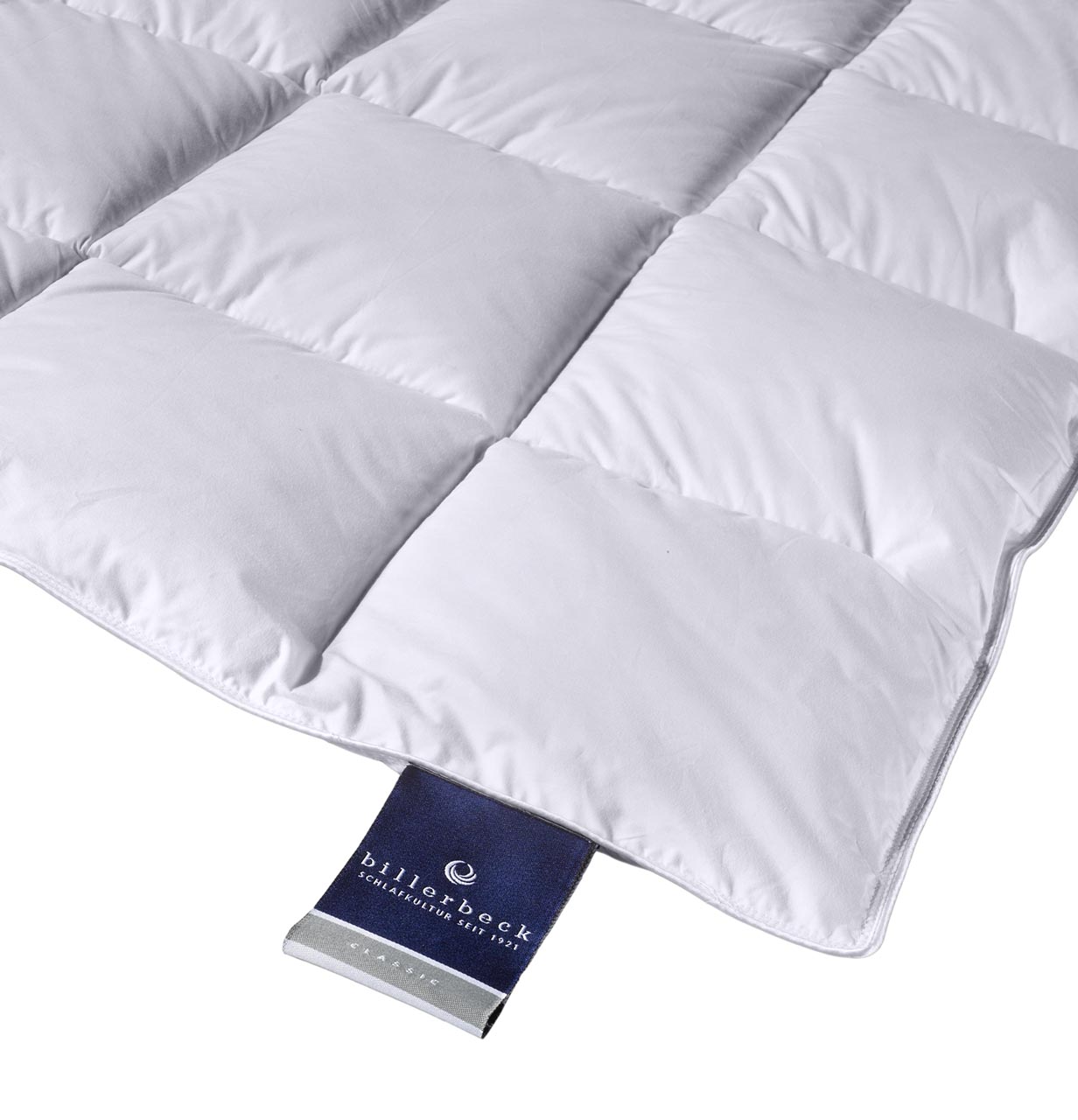 Detailed view of the Almira down duvet logo with light warmth level from billerbeck - soft cover and fine quilting